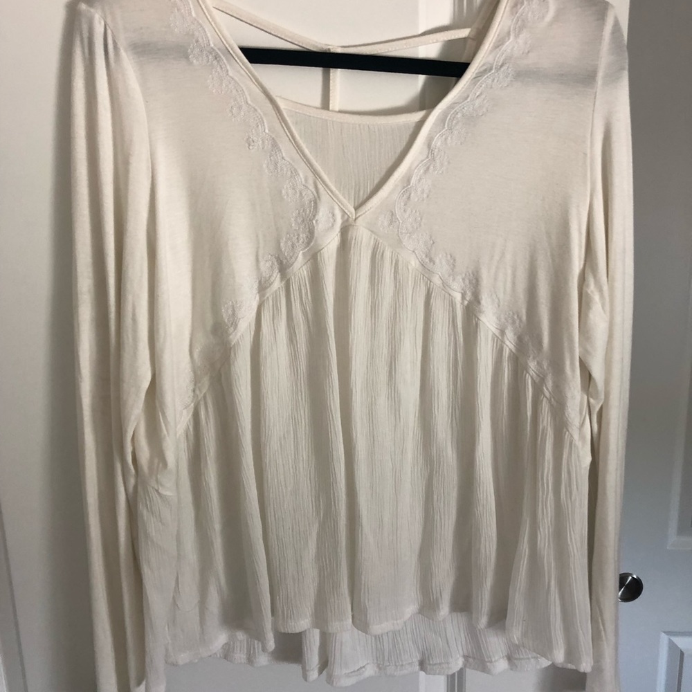 White flowy top from the buckle